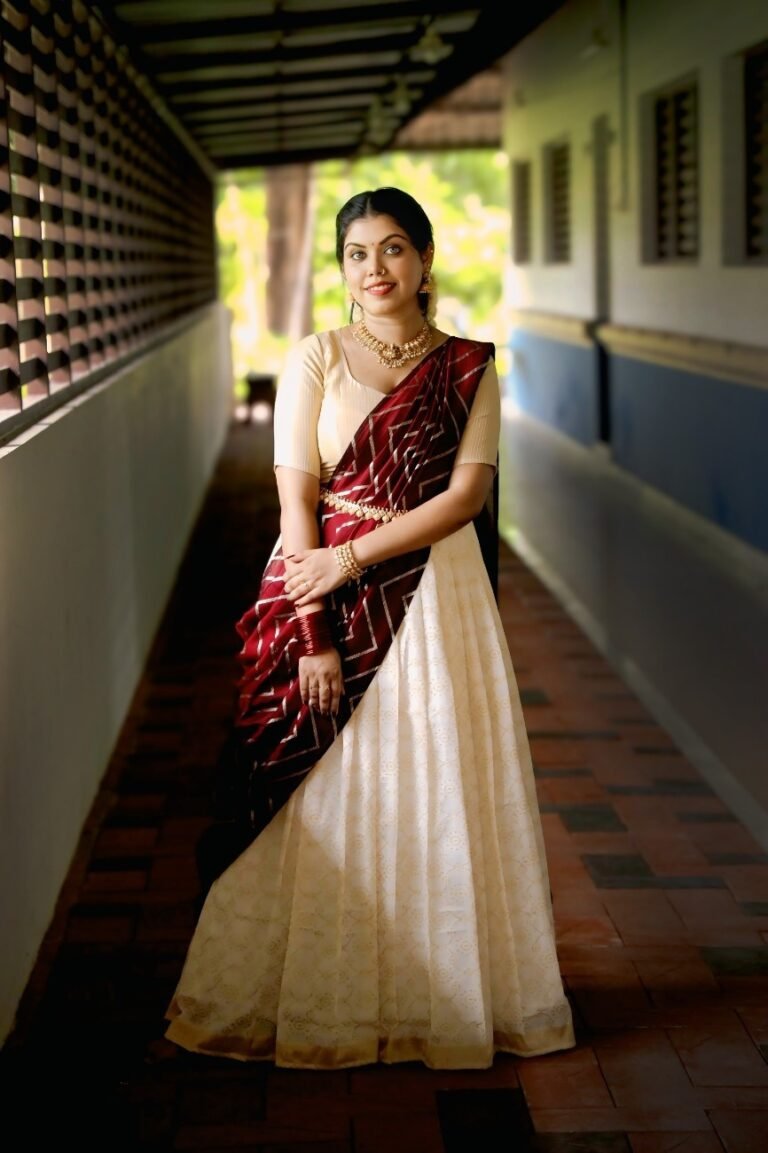 Close-up of a handmade embroidered kurti from Janki Design, featuring intricate threadwork inspired by Kerala’s traditional craftsmanship.