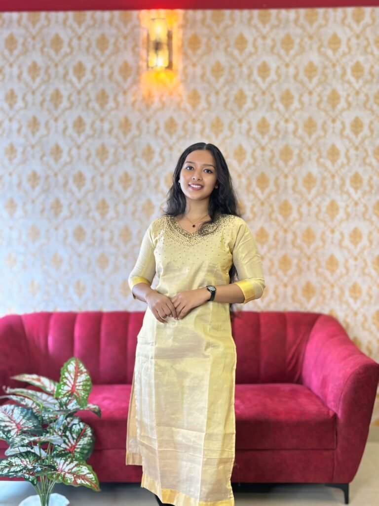 Striped yellow kurti with elegant green embroidery – Janki Design Kochi ethnic wear.