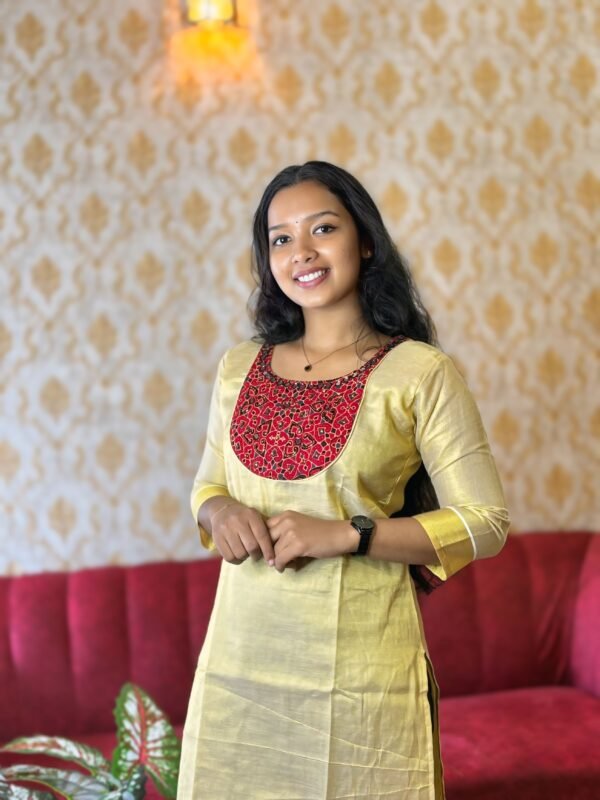 Festive kurti with red detailing – Premium ethnic wear from Janki Design, Kochi